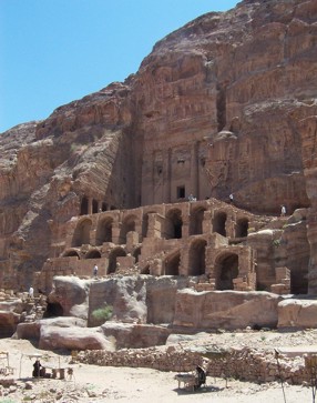 The first of the so called Royal Tombs is the Urn Tomb. This tomb is built high on the mountain side, and requires climbing up a number of flights of stairs. Abbe' Starcky has suggested that this is the tomb of Nabataean King Malchus II who died in 70 AD. Dr. Schmidt-Colinet on the other hand has proposed that this is the tomb of Aretas IV. Click to see a larger photo by James Wong of Vancouver.